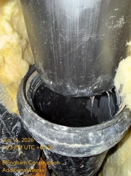 Pipe coupling within an exposed service void at Dockley Apartments