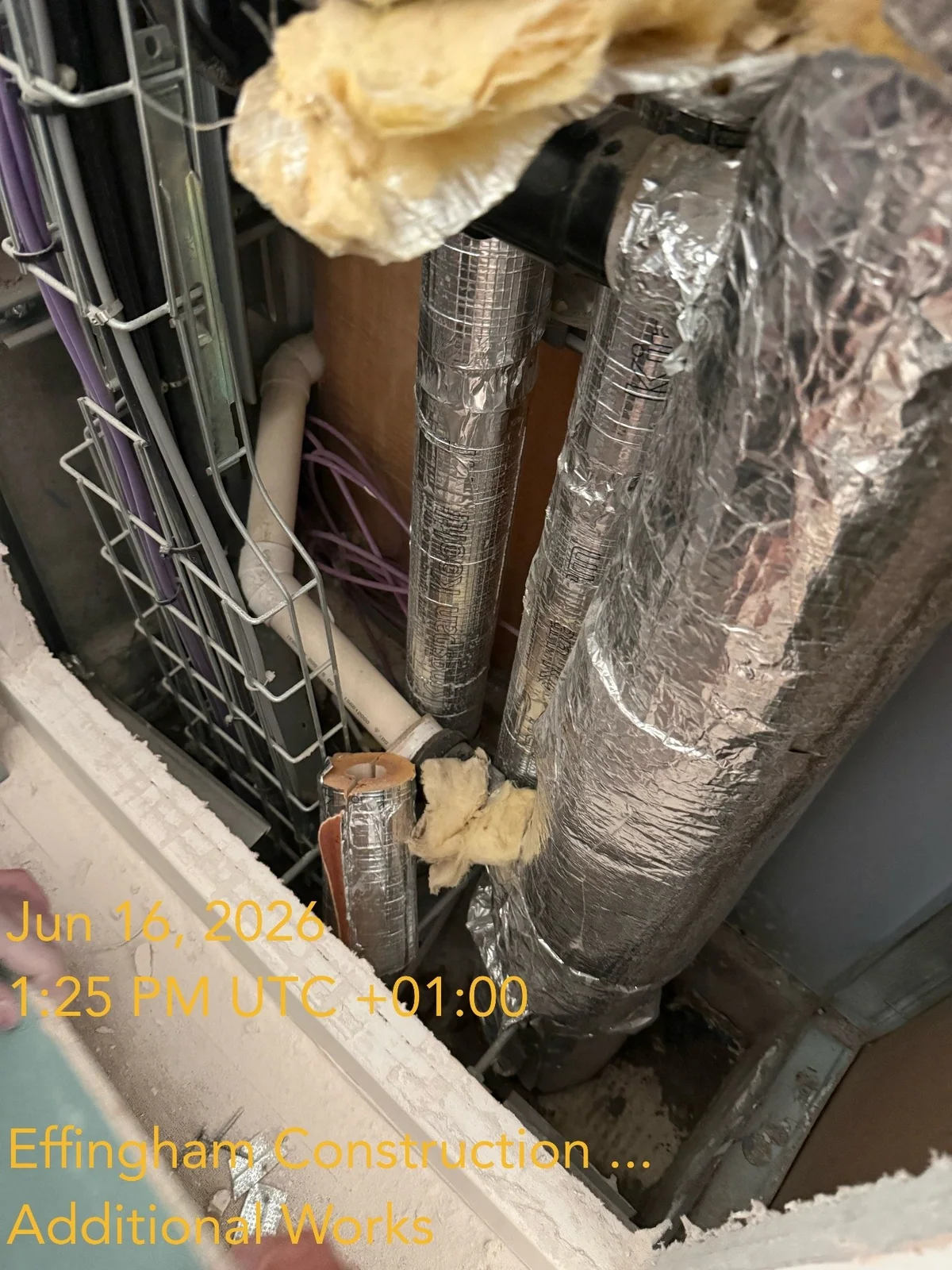 Service pipework and insulation at Dockley Apartments during remedial works