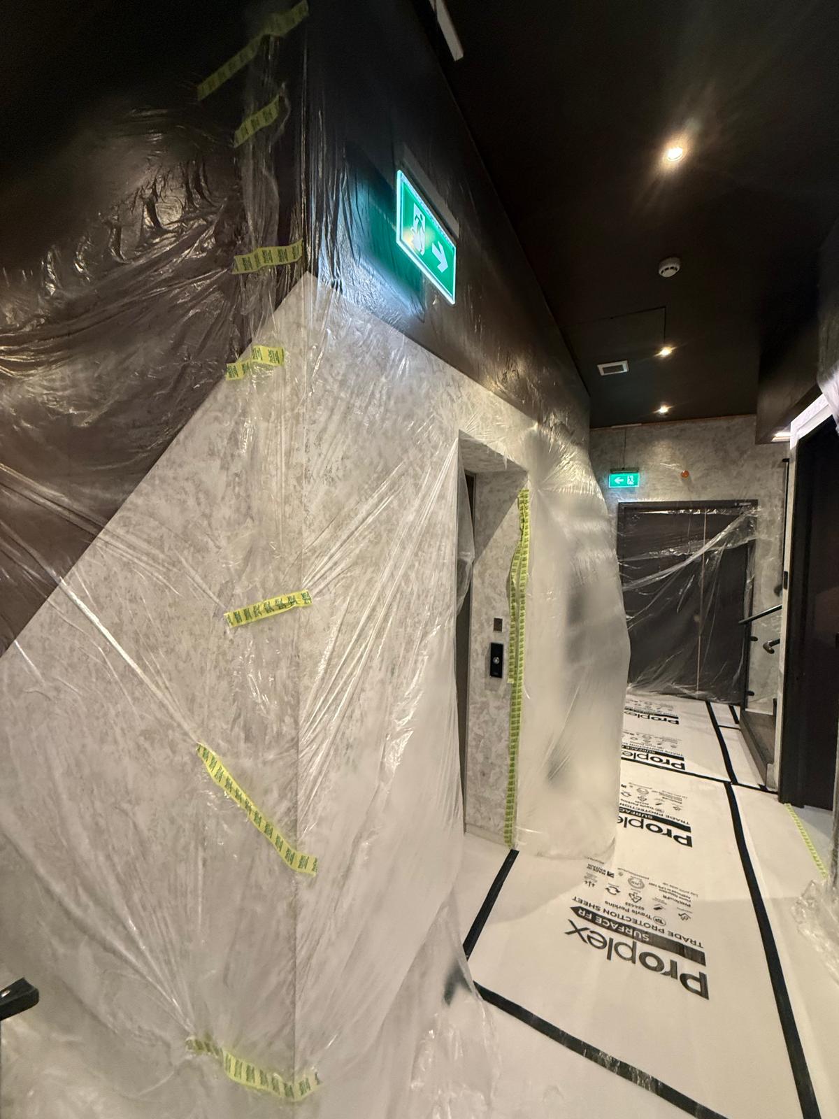 Protected finishes and access route during pool and spa ceiling works in Nine Elms