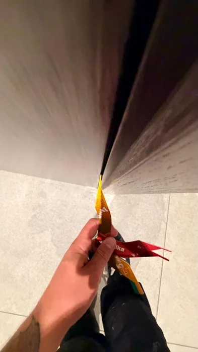 Checking a second communal fire-door gap during POWD works