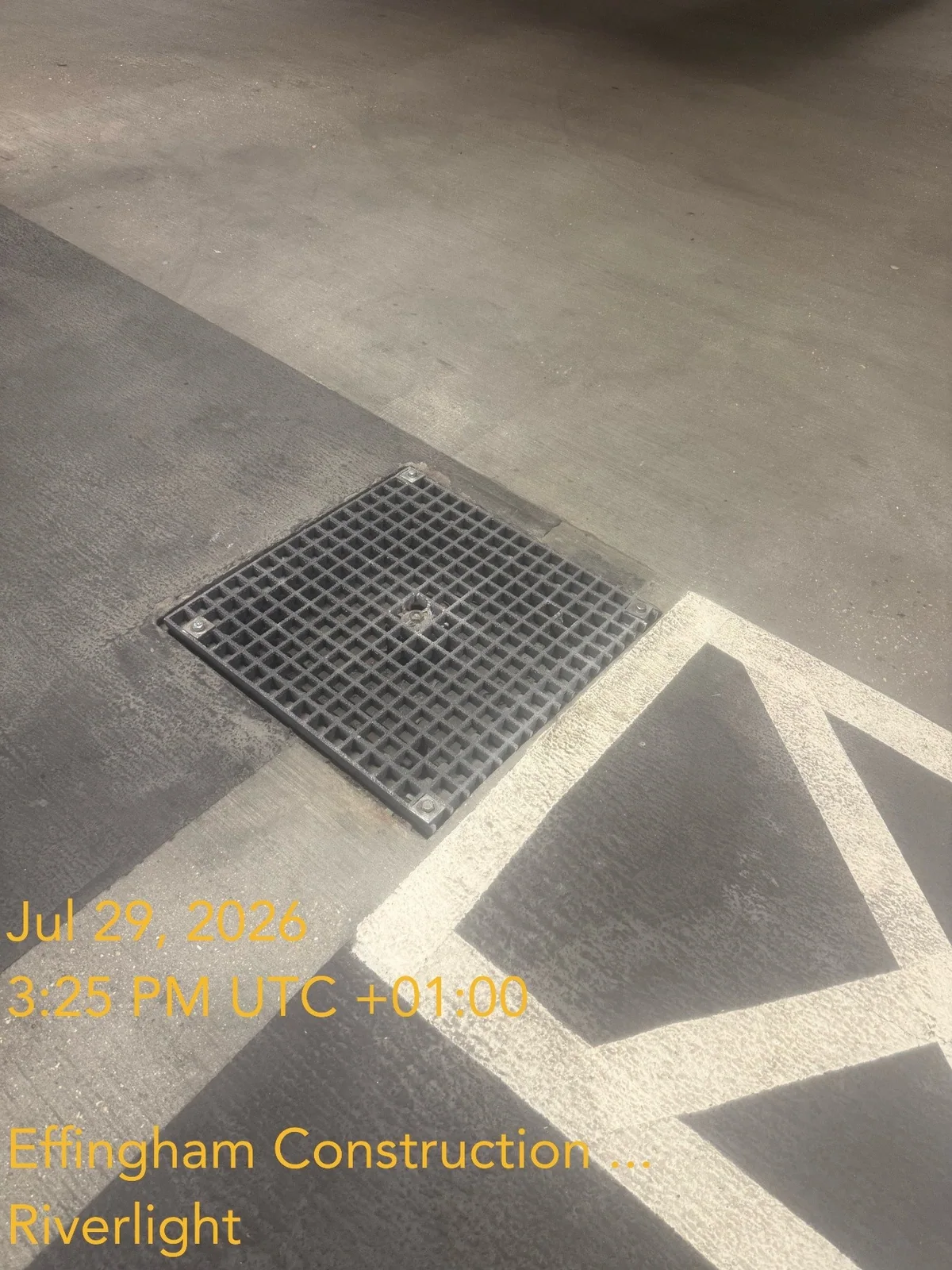 Replaced floor grille in a marked pedestrian area at a Riverlight residential estate